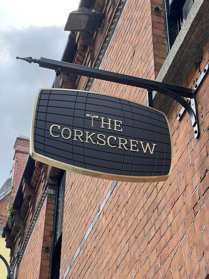 May be an image of text that says "THE CORKSCREW EW"
